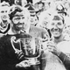 A photo of Ton y Brooks and Stirling Moss after winning the British Grand Prix.